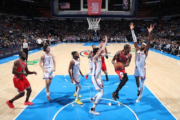 OKLAHOMA CITY, OK - NOVEMBER 22:  DeMar DeRozan #11 of the Chicago Bulls looks to pass the ball during the game against the Oklahoma City Thunder on November 22, 2023 at Paycom Arena in Oklahoma City, Oklahoma. NOTE TO USER: User expressly acknowledges and agrees that, by downloading and or using this photograph, User is consenting to the terms and conditions of the Getty Images License Agreement. Mandatory Copyright Notice: Copyright 2023 NBAE (Photo by Zach Beeker/NBAE via Getty Images)