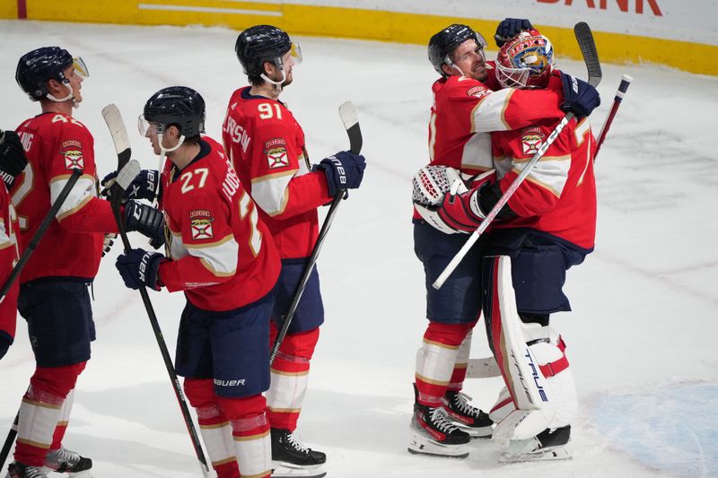 Dec 6, 2023; Sunrise, Florida, USA; Florida Panthers goaltender Sergei Bobrovsky (72) gets a hug following a victory against the Dallas Stars by center Nick Cousins (21) at Amerant Bank Arena. Mandatory Credit: Jim Rassol-USA TODAY Sports