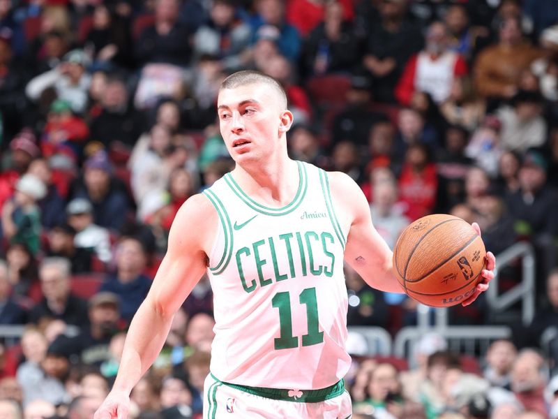 CHICAGO, IL - NOVEMBER 29: Payton Pritchard #11 of the Boston Celtics dribbles the ball during the game against the Chicago Bulls during the Emirates NBA Cup game on November 29, 2024 at United Center in Chicago, Illinois. NOTE TO USER: User expressly acknowledges and agrees that, by downloading and or using this photograph, User is consenting to the terms and conditions of the Getty Images License Agreement. Mandatory Copyright Notice: Copyright 2024 NBAE (Photo by Jeff Haynes/NBAE via Getty Images)