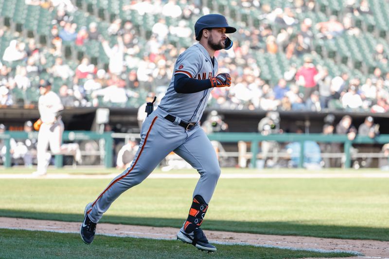 Apr 6, 2023; Chicago, Illinois, USA; San Francisco Giants first baseman J.D. Davis (7) rounds the bases after hitting a grand slam against the Chicago White Sox during the ninth inning at Guaranteed Rate Field. Mandatory Credit: Kamil Krzaczynski-USA TODAY Sports