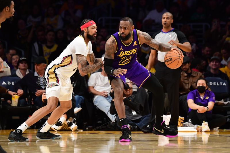 LOS ANGELES, CA - FEBRUARY 9:  LeBron James #23 of the Los Angeles Lakers handles the ball during the game against the New Orleans Pelicans on February 9, 2024 at Crypto.Com Arena in Los Angeles, California. NOTE TO USER: User expressly acknowledges and agrees that, by downloading and/or using this Photograph, user is consenting to the terms and conditions of the Getty Images License Agreement. Mandatory Copyright Notice: Copyright 2024 NBAE (Photo by Adam Pantozzi/NBAE via Getty Images)