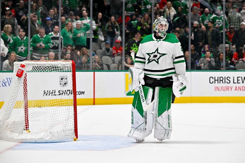 Jan 25, 2023; Dallas, Texas, USA; Dallas Stars goaltender Jake Oettinger (29) stands on the ice after the goal is knocked off its moorings during the third period against the Carolina Hurricanes at the American Airlines Center. Mandatory Credit: Jerome Miron-USA TODAY Sports