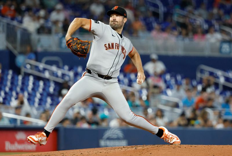 May 31, 2025; Miami, Florida, USA;  San Francisco Giants relief pitcher Kyle Harrison (45) pitches against the Miami Marlins during the first inning at loanDepot Park. Mandatory Credit: Rhona Wise-Imagn Images