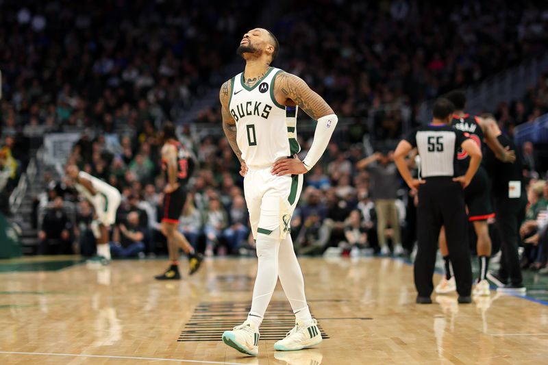 MILWAUKEE, WISCONSIN - APRIL 05: Damian Lillard #0 of the Milwaukee Bucks reacts after fouling out of the game against the Toronto Raptors at Fiserv Forum on April 05, 2024 in Milwaukee, Wisconsin. NOTE TO USER: User expressly acknowledges and agrees that, by downloading and or using this photograph, User is consenting to the terms and conditions of the Getty Images License Agreement. (Photo by Stacy Revere/Getty Images)