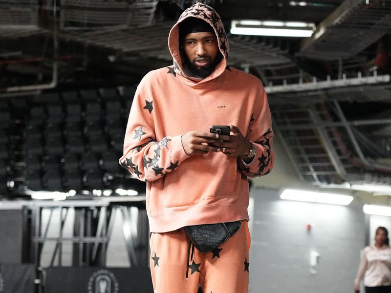 DALLAS, TX - MARCH 13: Derrick Jones Jr. #55 of the Dallas Mavericks arrives to the arena before the game against the Golden State Warriors on March 13, 2024 at the American Airlines Center in Dallas, Texas. NOTE TO USER: User expressly acknowledges and agrees that, by downloading and or using this photograph, User is consenting to the terms and conditions of the Getty Images License Agreement. Mandatory Copyright Notice: Copyright 2024 NBAE (Photo by Glenn James/NBAE via Getty Images)