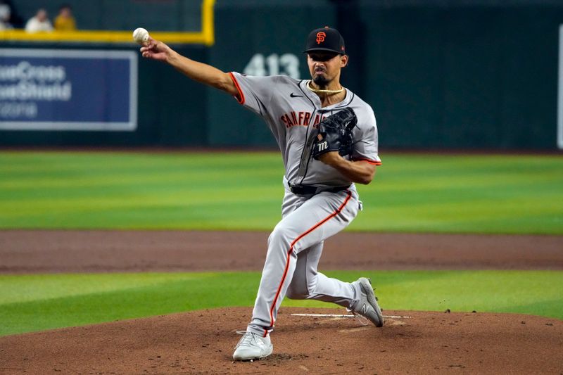 Jun 5, 2024; Phoenix, Arizona, USA; San Francisco Giants pitcher Jordan Hicks (12) throws against the Arizona Diamondbacks in the first inning at Chase Field. Mandatory Credit: Rick Scuteri-USA TODAY Sports