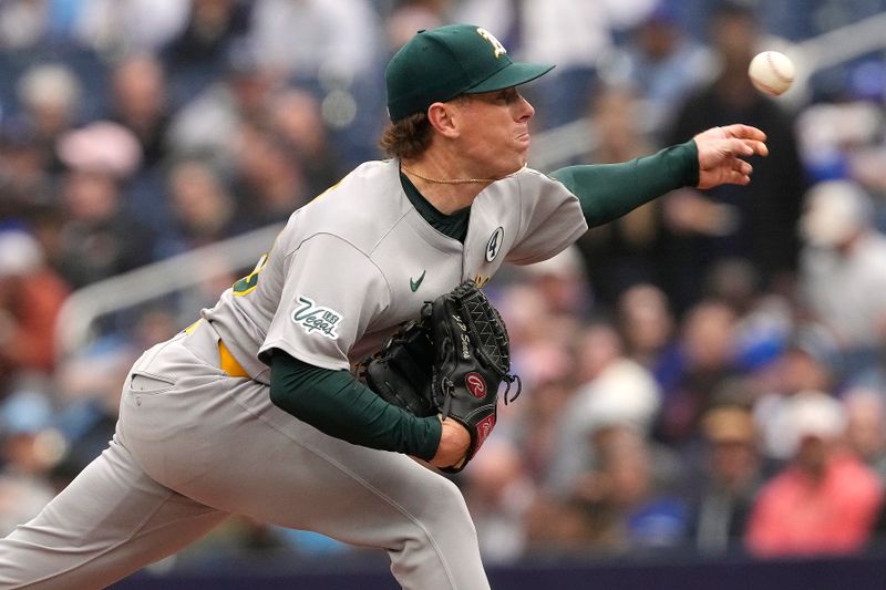 Jun 1, 2025; Toronto, Ontario, CAN; Oakland Athletics starting pitcher JP Sears (38) pitches to the Toronto Blue Jays during the fourth inning at Rogers Centre. Mandatory Credit: John E. Sokolowski-Imagn Images