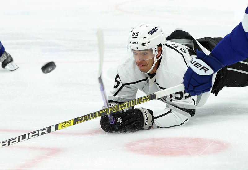 Jan 9, 2024; Tampa, Florida, USA; Los Angeles Kings right wing Quinton Byfield (55) goes after the puck against the Tampa Bay Lightning during the second period at Amalie Arena. Mandatory Credit: Kim Klement Neitzel-USA TODAY Sports