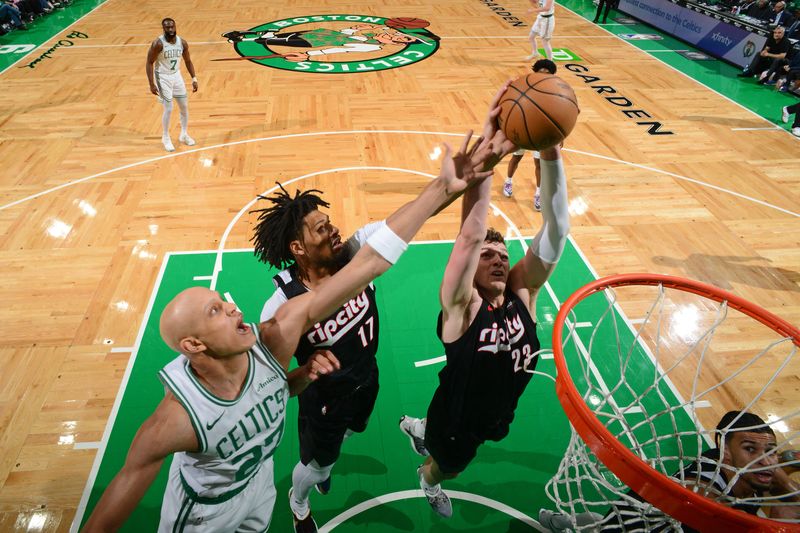 BOSTON, MA - MARCH 5: Donovan Clingan #23 of the Portland Trail Blazers goes up for the rebound during the game against the Portland Trail Blazers on March 5, 2025 at TD Garden in Boston, Massachusetts. NOTE TO USER: User expressly acknowledges and agrees that, by downloading and/or using this Photograph, user is consenting to the terms and conditions of the Getty Images License Agreement. Mandatory Copyright Notice: Copyright 2025 NBAE (Photo by Brian Babineau/NBAE via Getty Images)