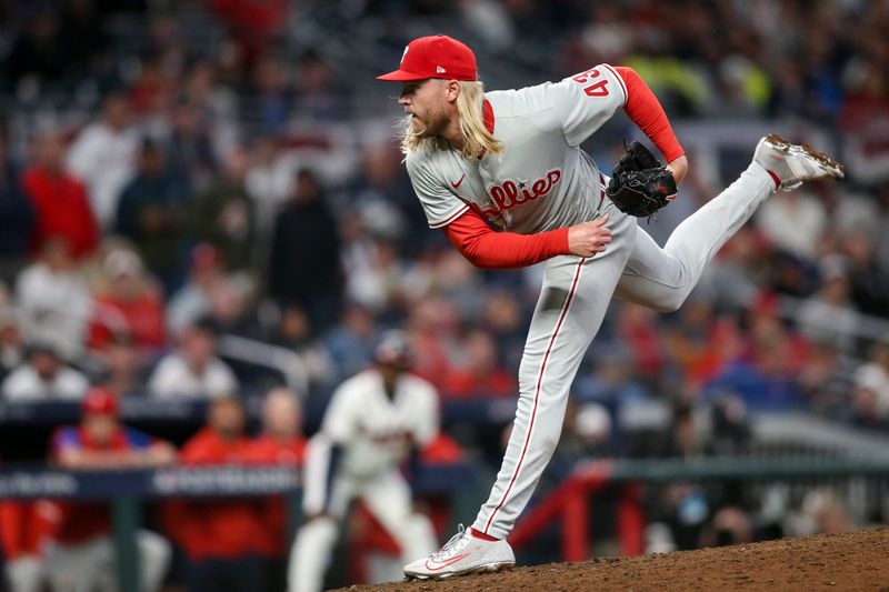 Oct 12, 2022; Atlanta, Georgia, USA; Philadelphia Phillies starting pitcher Noah Syndergaard (43) throws against the Atlanta Braves in the eighth inning during game two of the NLDS for the 2022 MLB Playoffs at Truist Park. Mandatory Credit: Brett Davis-USA TODAY Sports