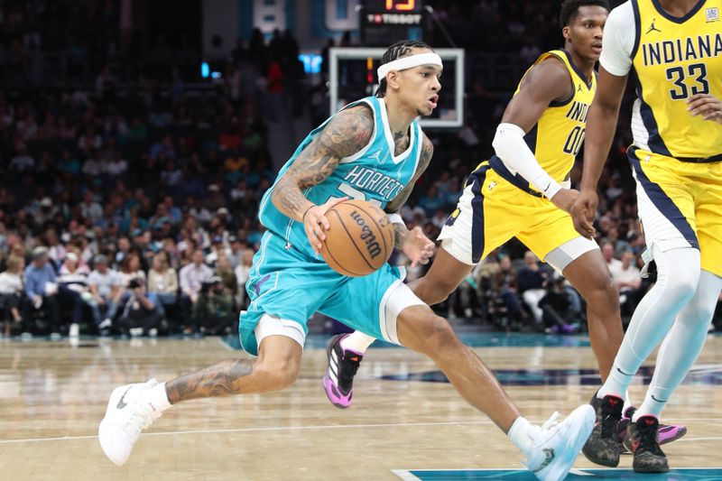 CHARLOTTE, NC - NOVEMBER 8: Tre Mann #23 of the Charlotte Hornets drives to the basket during the game against the Indiana Pacers on November 8, 2024 at Spectrum Center in Charlotte, North Carolina. NOTE TO USER: User expressly acknowledges and agrees that, by downloading and or using this photograph, User is consenting to the terms and conditions of the Getty Images License Agreement. Mandatory Copyright Notice: Copyright 2024 NBAE (Photo by Brock Williams-Smith/NBAE via Getty Images)