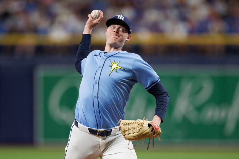 Jun 13, 2024; St. Petersburg, Florida, USA;  Tampa Bay Rays pitcher Pete Fairbanks (29) throws a pitch against the Chicago Cubs in the ninth inning at Tropicana Field. Mandatory Credit: Nathan Ray Seebeck-USA TODAY Sports