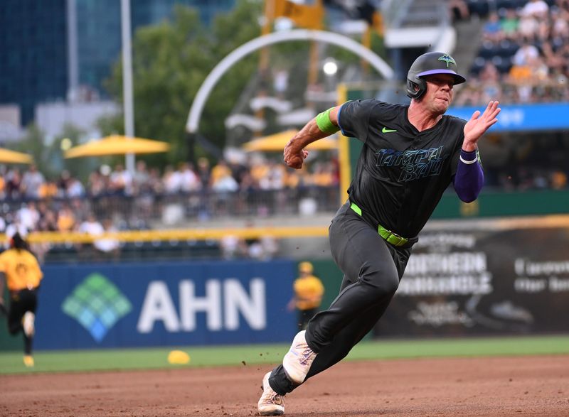 Jun 21, 2024; Pittsburgh, Pennsylvania, USA; Tampa Bay Rays catcher Ben Rortvedt (30) rounds third as he scores against the Pittsburgh Pirates during the fourth inning at PNC Park. Mandatory Credit: Philip G. Pavely-USA TODAY Sports