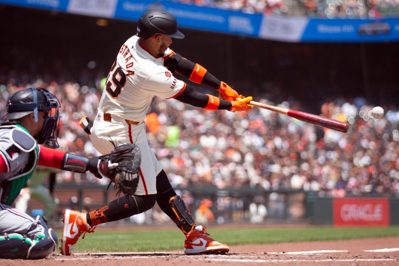 Jul 14, 2024; San Francisco, California, USA; San Francisco Giants second baseman Thairo Estrada (39) connects for an RBI single against the Minnesota Twins during the second inning at Oracle Park. Mandatory Credit: D. Ross Cameron-USA TODAY Sports