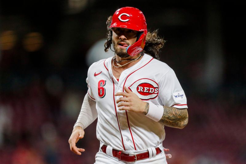 Sep 18, 2023; Cincinnati, Ohio, USA; Cincinnati Reds second baseman Jonathan India (6) scores on a RBI single hit by left fielder Spencer Steer (not pictured) in the seventh inning against the Minnesota Twins at Great American Ball Park. Mandatory Credit: Katie Stratman-USA TODAY Sports