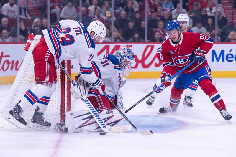 Oct 22, 2024; Ottawa, Ontario, CAN; New York Rangers goalie Igor Shesterkin (31) makes a save in front of Montreal Canadiens center Oliver Kapanen (91) in the second period at the Bell Centre. Mandatory Credit: Marc DesRosiers-Imagn Images