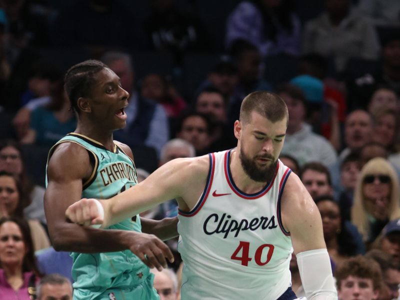 CHARLOTTE, NC - JANUARY 31:  Ivica Zubac #40 of the LA Clippers handles the ball during the game against the Charlotte Hornets on January 31, 2025 at Spectrum Center in Charlotte, North Carolina. NOTE TO USER: User expressly acknowledges and agrees that, by downloading and or using this photograph, User is consenting to the terms and conditions of the Getty Images License Agreement. Mandatory Copyright Notice: Copyright 2024 NBAE (Photo by Brock Williams-Smith/NBAE via Getty Images)