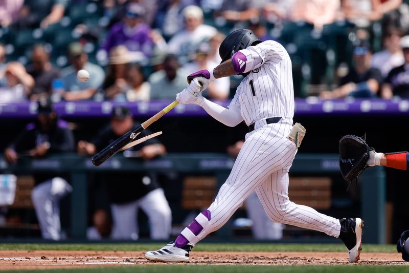 Apr 30, 2025; Denver, Colorado, USA; Colorado Rockies second baseman Adael Amador (1) cracks his bat on a swing in the third inning against the Atlanta Braves at Coors Field. Mandatory Credit: Isaiah J. Downing-Imagn Images
