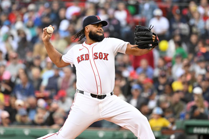 Sep 22, 2024; Boston, Massachusetts, USA;  Boston Red Sox pitcher Kenley Jansen (74) pitches against the Minnesota Twins during the ninth inning at Fenway Park. Mandatory Credit: Eric Canha-Imagn Images