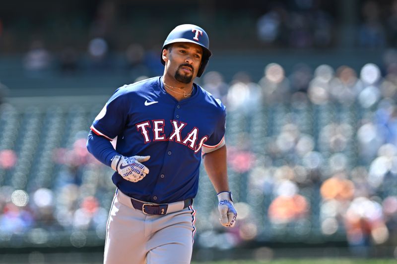 Apr 18, 2024; Detroit, Michigan, USA;  Texas Rangers second base Marcus Semien (2) runs the bases after hitting a home run against the Detroit Tigers in the first inning at Comerica Park. Mandatory Credit: Lon Horwedel-USA TODAY Sports