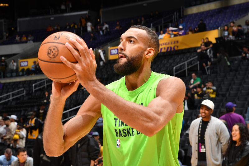 LOS ANGELES, CA - APRIL 7: Rudy Gobert #27 of the Minnesota Timberwolves warms up before the game against the Los Angeles Lakers on April 7, 2024 at Crypto.Com Arena in Los Angeles, California. NOTE TO USER: User expressly acknowledges and agrees that, by downloading and/or using this Photograph, user is consenting to the terms and conditions of the Getty Images License Agreement. Mandatory Copyright Notice: Copyright 2024 NBAE (Photo by Juan Ocampo/NBAE via Getty Images)