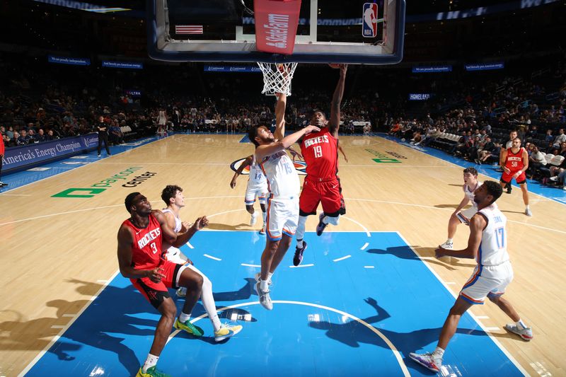 OKLAHOMA CITY, OK - OCTOBER 9: Nate Williams #19 of the Houston Rockets shoots the ball during the game against the Oklahoma City Thunder during a NBA pre season game on October 9, 2024 at Paycom Center in Oklahoma City, Oklahoma. NOTE TO USER: User expressly acknowledges and agrees that, by downloading and or using this photograph, User is consenting to the terms and conditions of the Getty Images License Agreement. Mandatory Copyright Notice: Copyright 2024 NBAE (Photo by Zach Beeker/NBAE via Getty Images)