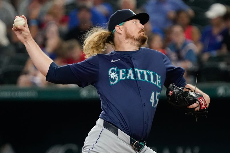 Apr 25, 2024; Arlington, Texas, USA; Seattle Mariners pitcher Ryne Stanek (45) throws to the plate during the seventh inning against the Texas Rangers at Globe Life Field. Mandatory Credit: Raymond Carlin III-USA TODAY Sports