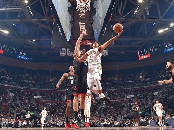 CLEVELAND, OH - DECEMBER 18: Craig Porter #9 of the Cleveland Cavaliers drives to the basket during the game against the Houston Rockets on December 18, 2023 at Rocket Mortgage FieldHouse in Cleveland, Ohio. NOTE TO USER: User expressly acknowledges and agrees that, by downloading and/or using this Photograph, user is consenting to the terms and conditions of the Getty Images License Agreement. Mandatory Copyright Notice: Copyright 2023 NBAE (Photo by David Liam Kyle/NBAE via Getty Images)