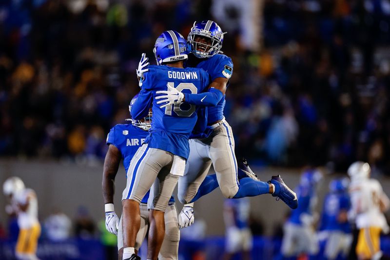 Oct 14, 2023; Colorado Springs, Colorado, USA; Air Force Falcons safety Trey Taylor (7) celebrates with safety Jayden Goodwin (16) after a play in the fourth quarter against the Wyoming Cowboys at Falcon Stadium. Mandatory Credit: Isaiah J. Downing-USA TODAY Sports