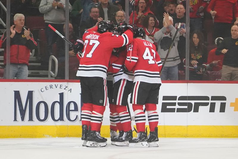 Oct 25, 2024; Chicago, Illinois, USA; Chicago Blackhawks center Craig Smith (15) celebrates his goal against the Nashville Predators during the first period at the United Center. Mandatory Credit: David Banks-Imagn Images