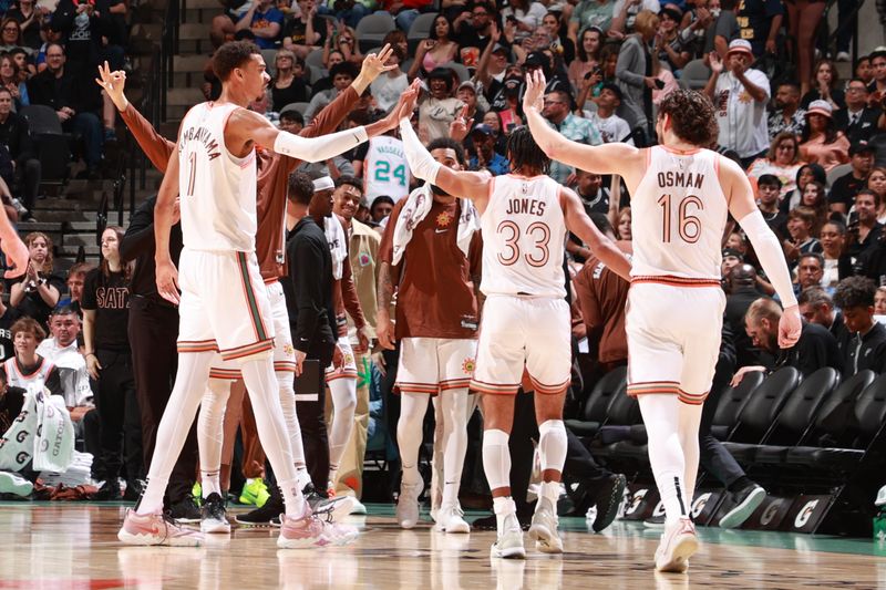 SAN ANTONIO, TX - MARCH 31: The San Antonio Spurs celebrate a three point basket during the game against the Golden State Warriors on March 31, 2024 at the Frost Bank Center in San Antonio, Texas. NOTE TO USER: User expressly acknowledges and agrees that, by downloading and or using this photograph, user is consenting to the terms and conditions of the Getty Images License Agreement. Mandatory Copyright Notice: Copyright 2024 NBAE (Photos by Joe Murphy/NBAE via Getty Images)