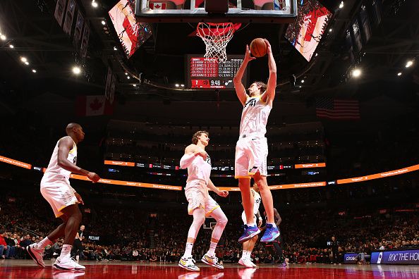 TORONTO, CANADA - DECEMBER 23:  Kelly Olynyk #41 of the Utah Jazz grabs a rebound during the game against the Toronto Raptors on December 23, 2023 at the Scotiabank Arena in Toronto, Ontario, Canada.  NOTE TO USER: User expressly acknowledges and agrees that, by downloading and or using this Photograph, user is consenting to the terms and conditions of the Getty Images License Agreement.  Mandatory Copyright Notice: Copyright 2023 NBAE (Photo by Vaughn Ridley/NBAE via Getty Images)