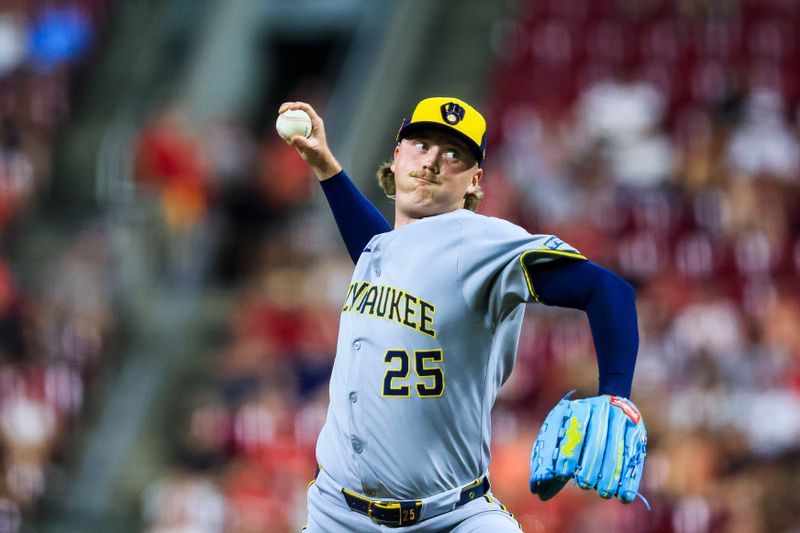 Aug 16, 2025; Cincinnati, Ohio, USA; Milwaukee Brewers relief pitcher Nick Mears (25) pitches against the Cincinnati Reds in the eleventh inning at Great American Ball Park. Mandatory Credit: Katie Stratman-Imagn Images