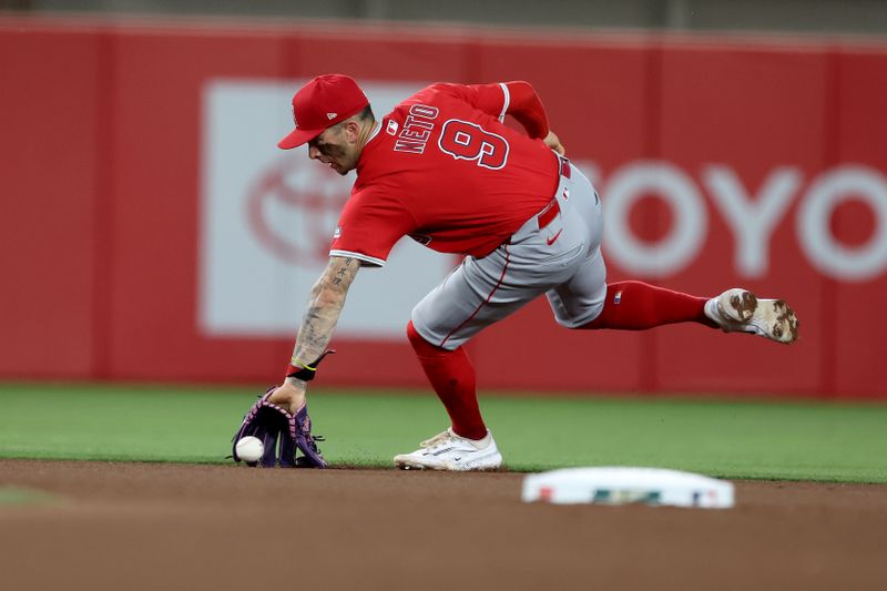 May 19, 2025; West Sacramento, California, USA; Los Angeles Angels shortstop Zach Neto (9) fields a ground ball against the Athletics during the fourth inning at Sutter Health Park. Mandatory Credit: Dennis Lee-Imagn Images