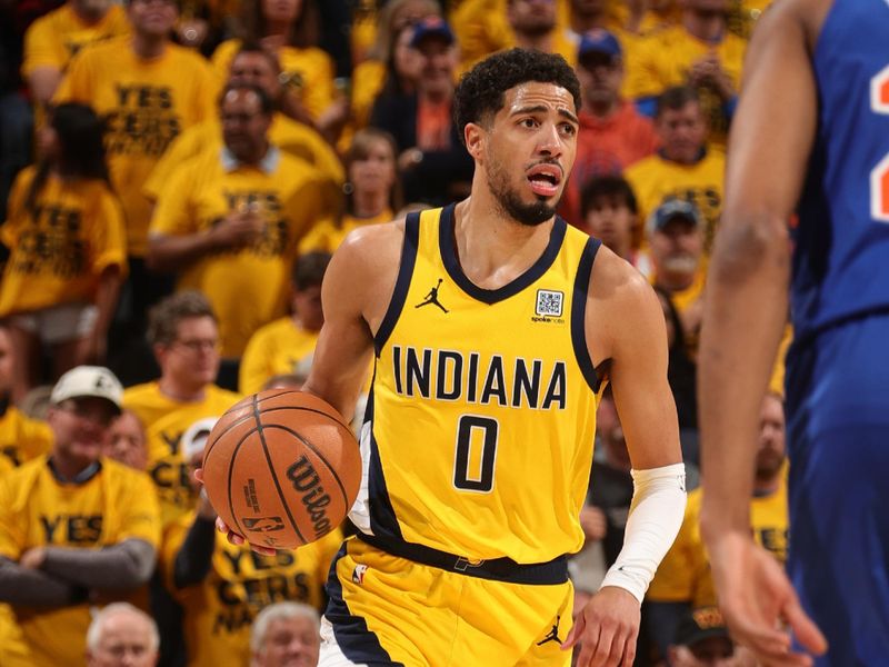 INDIANAPOLIS, IN - MAY 27:   Tyrese Haliburton #0 of the Indiana Pacers dribbles the ball during the game against the New York Knicks  during Game 4 of the 2025 Eastern Conference Finals on May 27, 2025 at Gainbridge Fieldhouse in Indianapolis, Indiana. NOTE TO USER: User expressly acknowledges and agrees that, by downloading and or using this Photograph, user is consenting to the terms and conditions of the Getty Images License Agreement. Mandatory Copyright Notice: Copyright 2025 NBAE (Photo by Nathaniel S. Butler/NBAE via Getty Images)