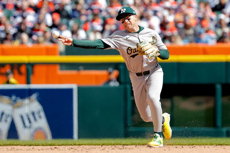 Apr 6, 2024; Detroit, Michigan, USA;  Oakland Athletics shortstop Nick Allen (10) makes a throw to first base against the Detroit Tigers in the seventh inning at Comerica Park. Mandatory Credit: Rick Osentoski-USA TODAY Sports