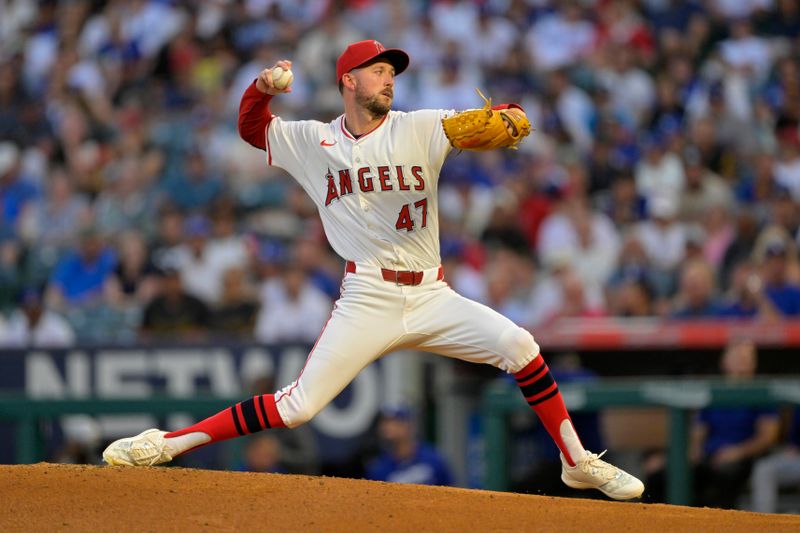 Sep 4, 2024; Anaheim, California, USA;  Los Angeles Angels starting pitcher Griffin Canning (47) delivers to the plate in the second inning against the Los Angeles Dodgers at Angel Stadium. Mandatory Credit: Jayne Kamin-Oncea-Imagn Images