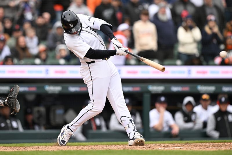 Apr 6, 2025; Detroit, Michigan, USA;  Detroit Tigers first baseman Spencer Torkelson (20) hits a game-winning walk off double against the Chicago White Sox in the ninth inning at Comerica Park. Mandatory Credit: Lon Horwedel-Imagn Images