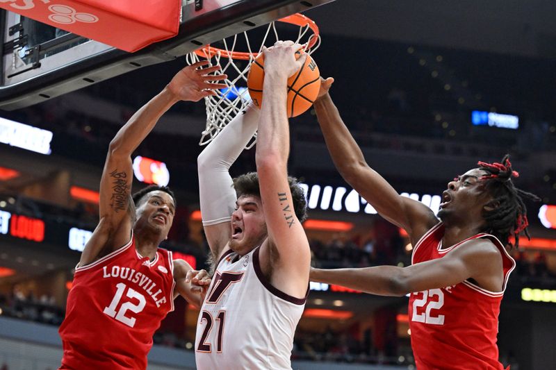 Feb 28, 2023; Louisville, Kentucky, USA; Virginia Tech Hokies forward Grant Basile (21) battles for control of the ball with Louisville Cardinals forward JJ Traynor (12) and orward Kamari Lands (22) during the first half at KFC Yum! Center. /Virginia Tech defeated Louisville 71-54. Mandatory Credit: Jamie Rhodes-USA TODAY Sports