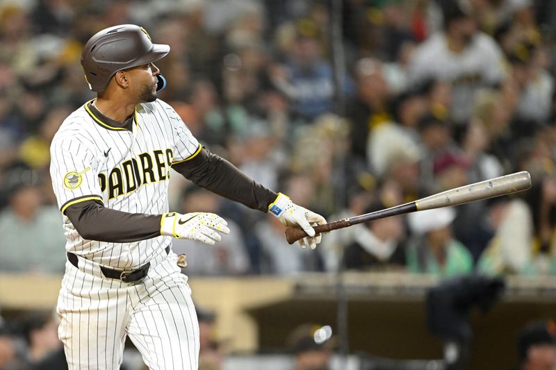 Apr 29, 2025; San Diego, California, USA; San Diego Padres shortstop Xander Bogaerts (2) hits a two-run home run during the seventh inning against the San Francisco Giants at Petco Park. Mandatory Credit: Denis Poroy-Imagn Images