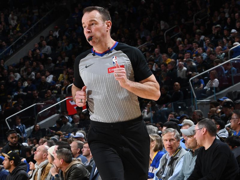 SAN FRANCISCO, CA - FEBRUARY 23: Referee, Josh Tiven #58 looks on during the game between the Charlotte Hornets  and the Golden State Warriors on February 23, 2024 at Chase Center in San Francisco, California. NOTE TO USER: User expressly acknowledges and agrees that, by downloading and or using this photograph, user is consenting to the terms and conditions of Getty Images License Agreement. Mandatory Copyright Notice: Copyright 2024 NBAE (Photo by Noah Graham/NBAE via Getty Images)