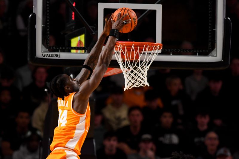 Jan 18, 2025; Nashville, Tennessee, USA;  Tennessee Volunteers forward Felix Okpara (34) dunks the ball against the Vanderbilt Commodores during the first half at Memorial Gymnasium. Mandatory Credit: Steve Roberts-Imagn Images