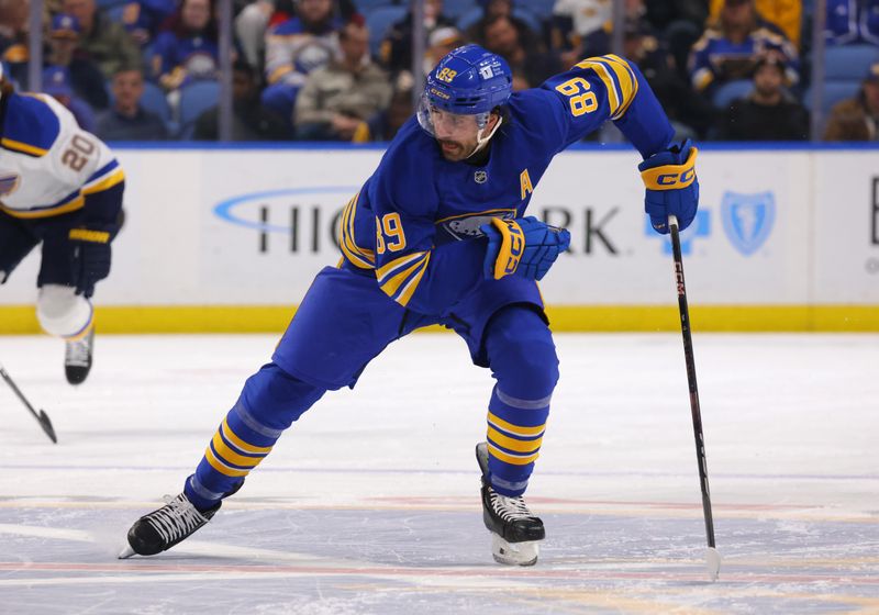 Nov 14, 2024; Buffalo, New York, USA;  Buffalo Sabres right wing Alex Tuch (89) skates up ice during the second period against the St. Louis Blues at KeyBank Center. Mandatory Credit: Timothy T. Ludwig-Imagn Images