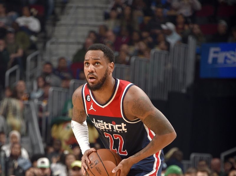 CLEVELAND, OH - MARCH 17: Monte Morris #22 of the Washington Wizards looks to pass the ball during the game against the Cleveland Cavaliers on March 17, 2023 at Rocket Mortgage FieldHouse in Cleveland, Ohio. NOTE TO USER: User expressly acknowledges and agrees that, by downloading and/or using this Photograph, user is consenting to the terms and conditions of the Getty Images License Agreement. Mandatory Copyright Notice: Copyright 2023 NBAE (Photo by David Liam Kyle/NBAE via Getty Images)