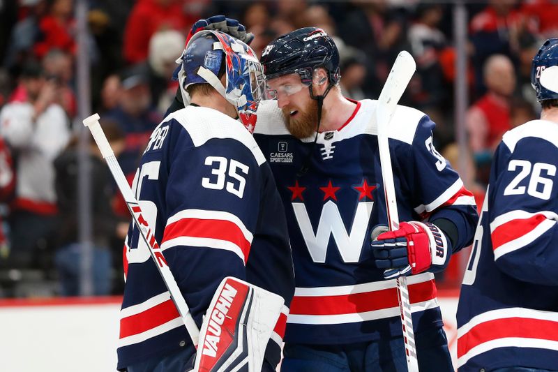 Jan 7, 2024; Washington, District of Columbia, USA; Washington Capitals right wing Anthony Mantha (39) celebrates with Washington Capitals goaltender Darcy Kuemper (35) after defeating the Los Angeles Kings at Capital One Arena. Mandatory Credit: Amber Searls-USA TODAY Sports