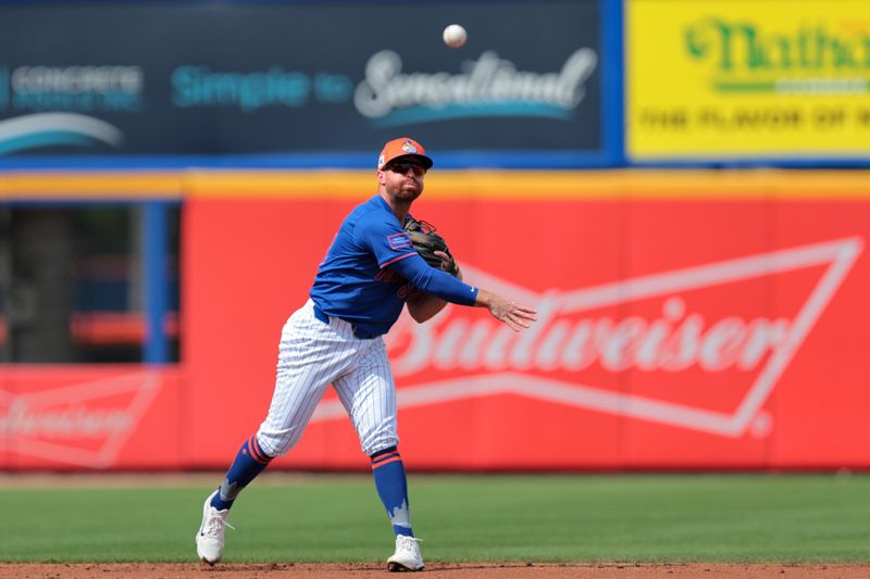 Feb 27, 2025; Port St. Lucie, Florida, USA; New York Mets shortstop Donovan Walton (83) throws to first base and retires Houston Astros left fielder Zach Dezenzo (not pictured) during the second inning at Clover Park. Mandatory Credit: Sam Navarro-Imagn Images