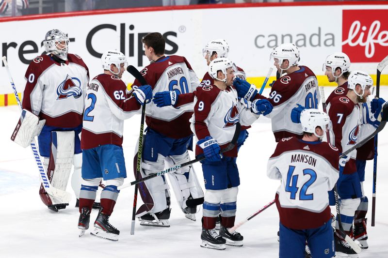 Apr 30, 2024; Winnipeg, Manitoba, CAN; Colorado Avalanche celebrate their victory over the Winnipeg Jets in game five of the first round of the 2024 Stanley Cup Playoffs at Canada Life Centre. Mandatory Credit: James Carey Lauder-USA TODAY Sports