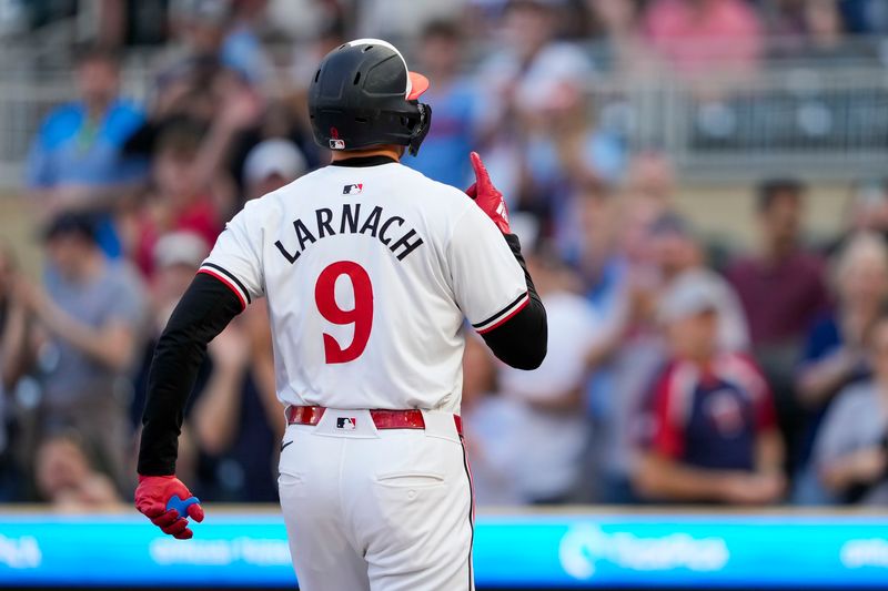 May 8, 2024; Minneapolis, Minnesota, USA; Minnesota Twins designated hitter Trevor Larnach (9) celebrates after hitting a solo home run against the Seattle Mariners in the first inning at Target Field. Mandatory Credit: Jesse Johnson-USA TODAY Sports