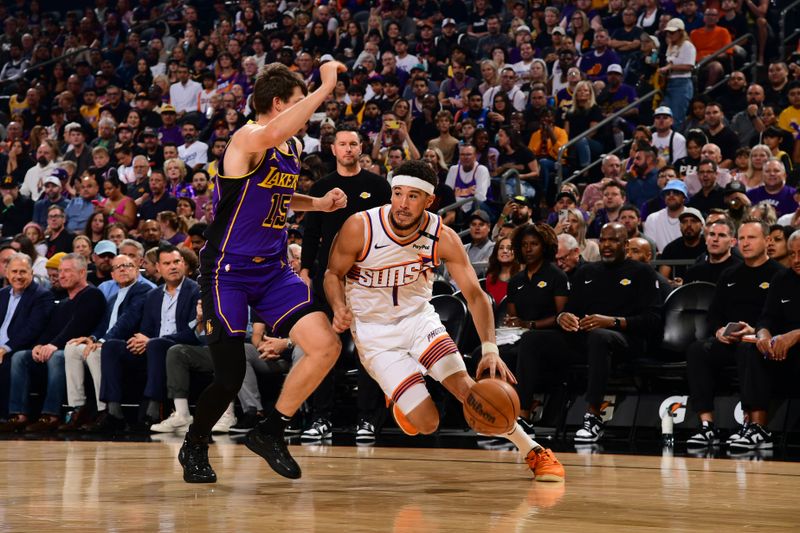 PHOENIX, AZ - OCTOBER 28: Devin Booker #1 of the Phoenix Suns dribbles the ball during the game against the Los Angeles Lakers on October 28, 2024 at Footprint Center in Phoenix, Arizona. NOTE TO USER: User expressly acknowledges and agrees that, by downloading and or using this photograph, user is consenting to the terms and conditions of the Getty Images License Agreement. Mandatory Copyright Notice: Copyright 2024 NBAE (Photo by Kate Frese/NBAE via Getty Images)