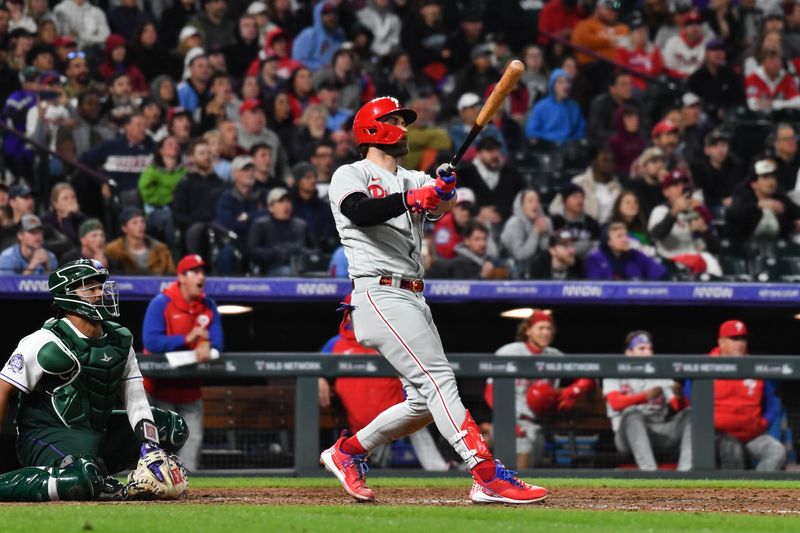 May 13, 2023; Denver, Colorado, USA; Philadelphia Phillies designated hitter Bryce Harper (3) hits a home run in the ninth inning against the Colorado Rockies at Coors Field. Mandatory Credit: John Leyba-USA TODAY Sports